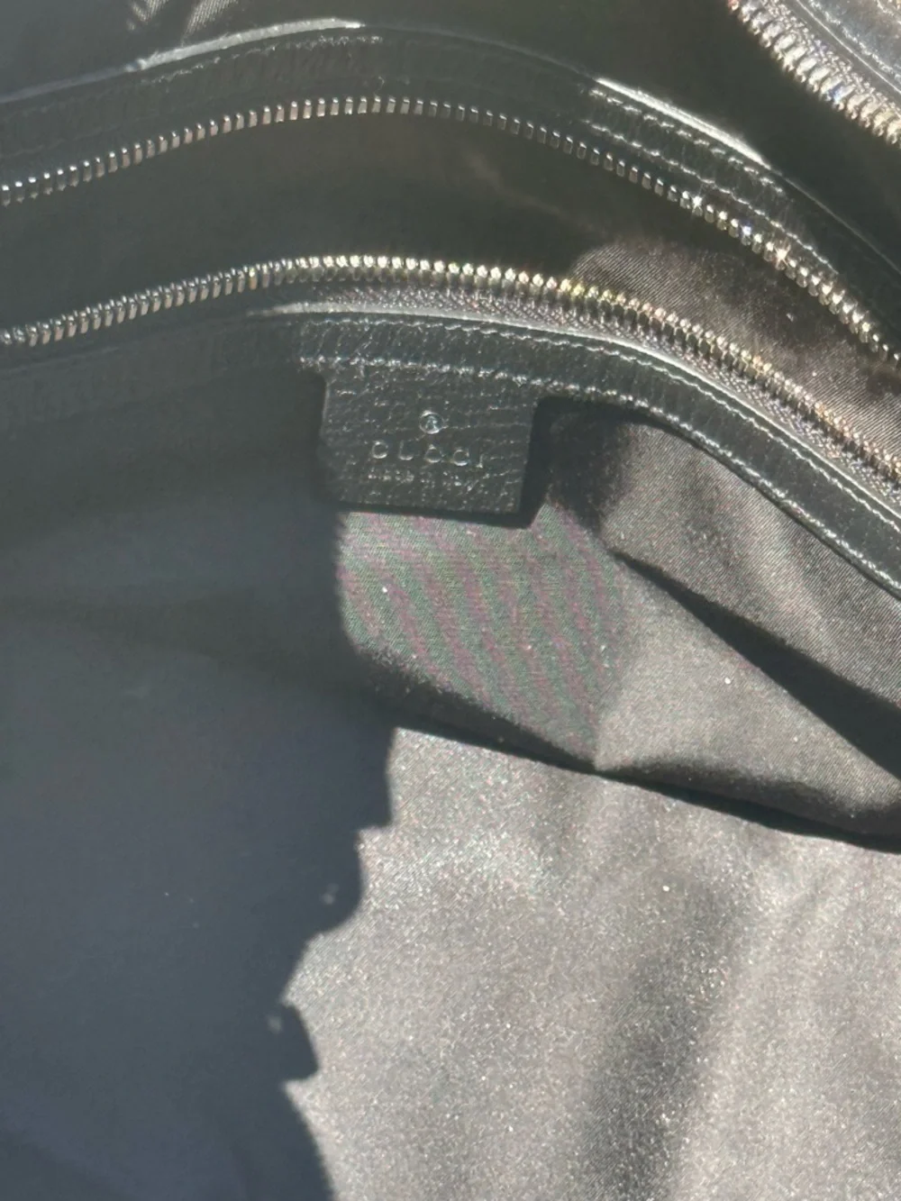 Gucci GG Canvas Duffel Bag – Black Monogram Gold Logo Travel Bag with Strap
